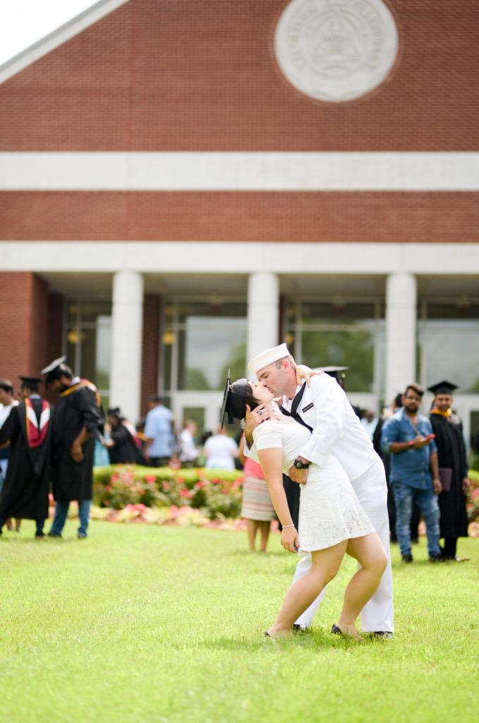 Haley Probus of Johns Island, S.C., and her boyfriend, Cameron Bellantonio reenacts the famous 1945's “V-Day and The Kiss” scene, in front of Ransdell Chapel at Campbellsville University. (Campbellsville University Photo by Joshua Williams)