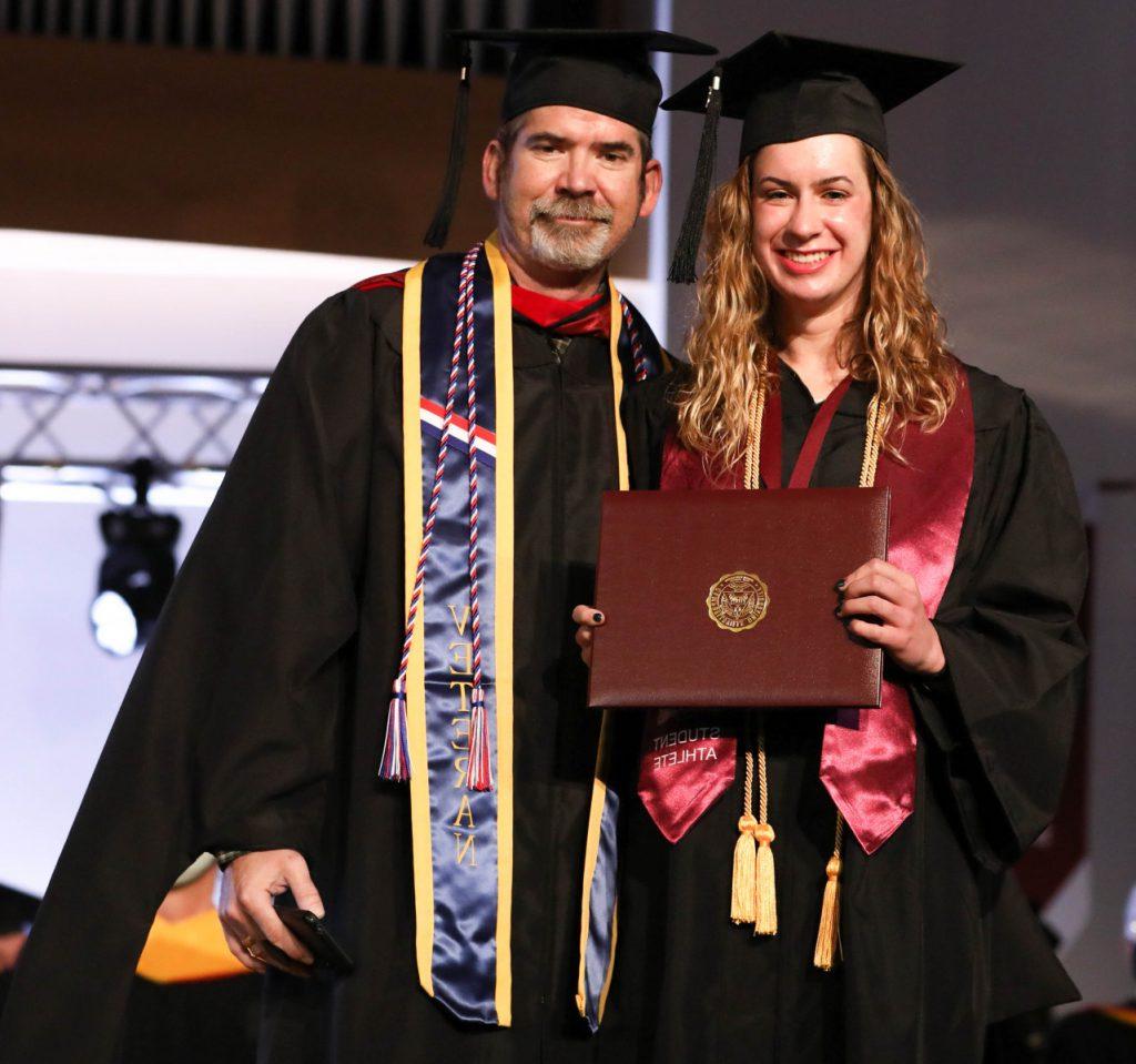 Campbellsville University candidates for graduation are told to ‘take on this world, do it well and make your mark' 3