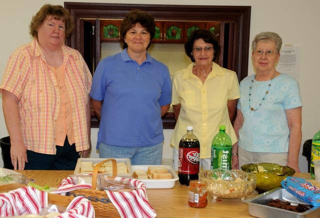 Albany First Baptist Church volunteers who served lunch to Kids College students included, from left; Phyllis Blair, Doris Brown, Pam Theele and Katherine Wireman. All are members of the WMU, part of the kitchen committee and Wireman is with the church library. (CU Photo by Linda Waggener)