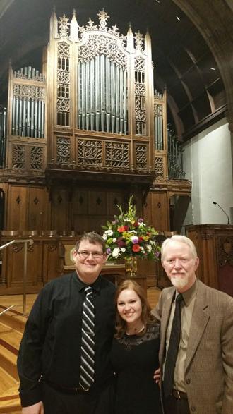 standing in front of organ