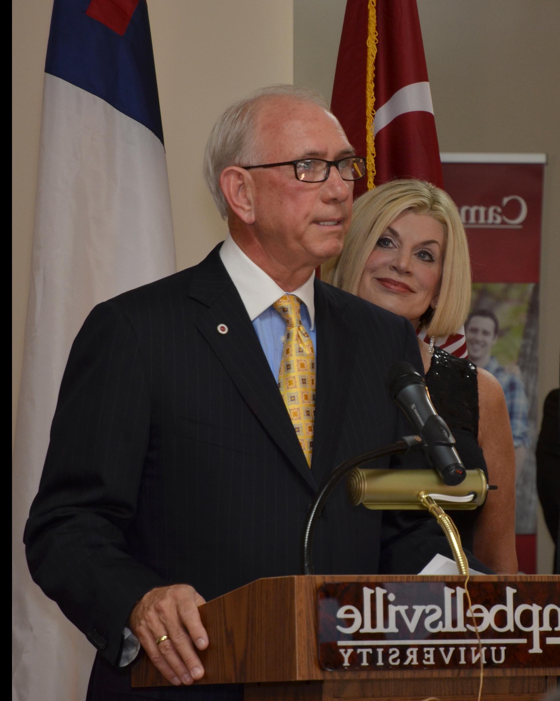 Dr. Larry Noe, with his wife Beverly by his side, addressed  the crowd in attendance at the dedication of Campbellsville  University's new location in Somerset, named in their honor.  (Campbellsville University photo by Linda Waggener)