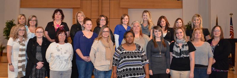 Attending the Allied Health Program Pinning Ceremony at Campbellsville University’s Virginia Ponser Flanagan Technology Training Center were from left: Front row – Lori Alvizo, Elizabeth Mackay, Corey Kaufman, Ashley Willis, Mary Wood, Tabatha Capps, Nicole Jones, Arlene Underwood, Stephanie Jensen and Kayla Hager. Back row -- Melissa Mattingly, Millie Cheser, Danielle Patrick, Megan Craig, Jaime Phelps, Amy Boils, Stephanie Bishop, Debbie Glasscock, Ginni Thompson, Heather Cecil and Christie Glasscock. (Campbellsville University Photo by Drew Tucker)