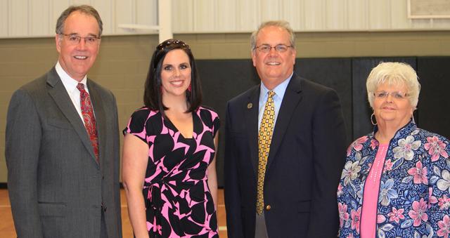 Ashli Watts, third from left, visited Campbellsville/Taylor County Chamber of Commerce as Dave Adkisson, president and chief executive officer of the Kentucky Chamber of Commerce, spoke to the chamber members. Watts is manager of public affairs for the Kentucky Chamber of Commerce. At left is Judy Cox, director of the Campbellsville-Taylor County Chamber; and Campbellsville Mayor Tony Young.