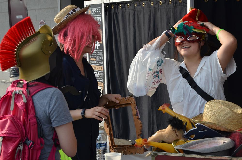 Tomomi Sato (left) is all smiles as she and her friends, Ayami Nakano (center) and Miku Kawaski (right) play dress up. (Campbellsville University photo by Drew Tucker)