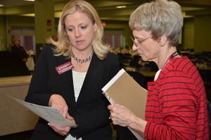 Dr. Patricia Swails, left, board of examiners  chair, professor of education at Oakland City University in Oakland City, Ind., talks with Dr.  Donna Hedgepath, associate professor of education and associate dean, who was NCATE coordinator.  (Campbellsville University Photo by Joan C. McKinney)