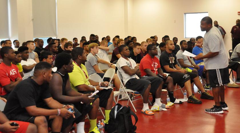 Campbellsville University football team coach Perry Thomas talks about servant leadership with his team. (Campbellsville University Photo by Chris Megginson)