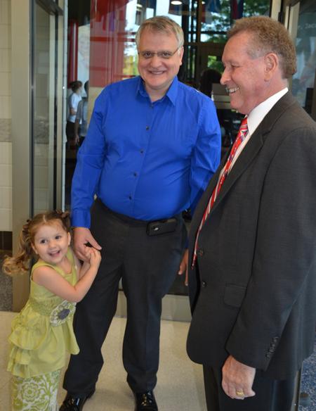 George Kargas and his daughter, Sarabeth Kargas, talk with Dr. Frank Cheatham, vice president for academic affairs, before the ceremony  began at Somerset. Kargas' wife, Amanda, received a bachelor of social work degree. (Campbellsville University Photo by Joan C. McKinney)