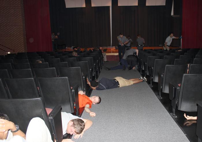 Explorers of the Kentucky Law Enforcement Explorer Academy depicts movie theatre real-life shoot out simulation. (Campbellsville University Photo by Joshua Williams) 