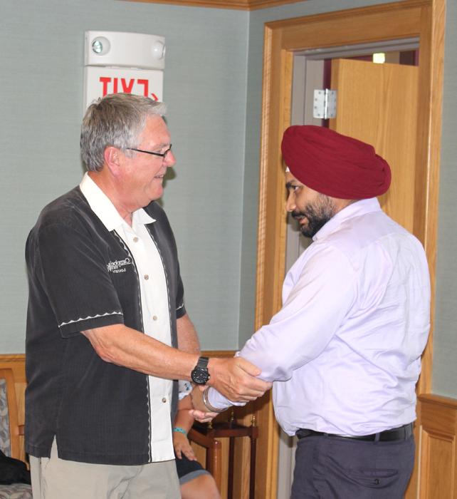 Dr. Keith Spears, vice president for communication and assistant to the president (on right) welcomes Dr. H.S. Saini, managing director of the Hyderabad campus, to Campbellsville University. (Campbellsville University Photo by Joshua Williams)