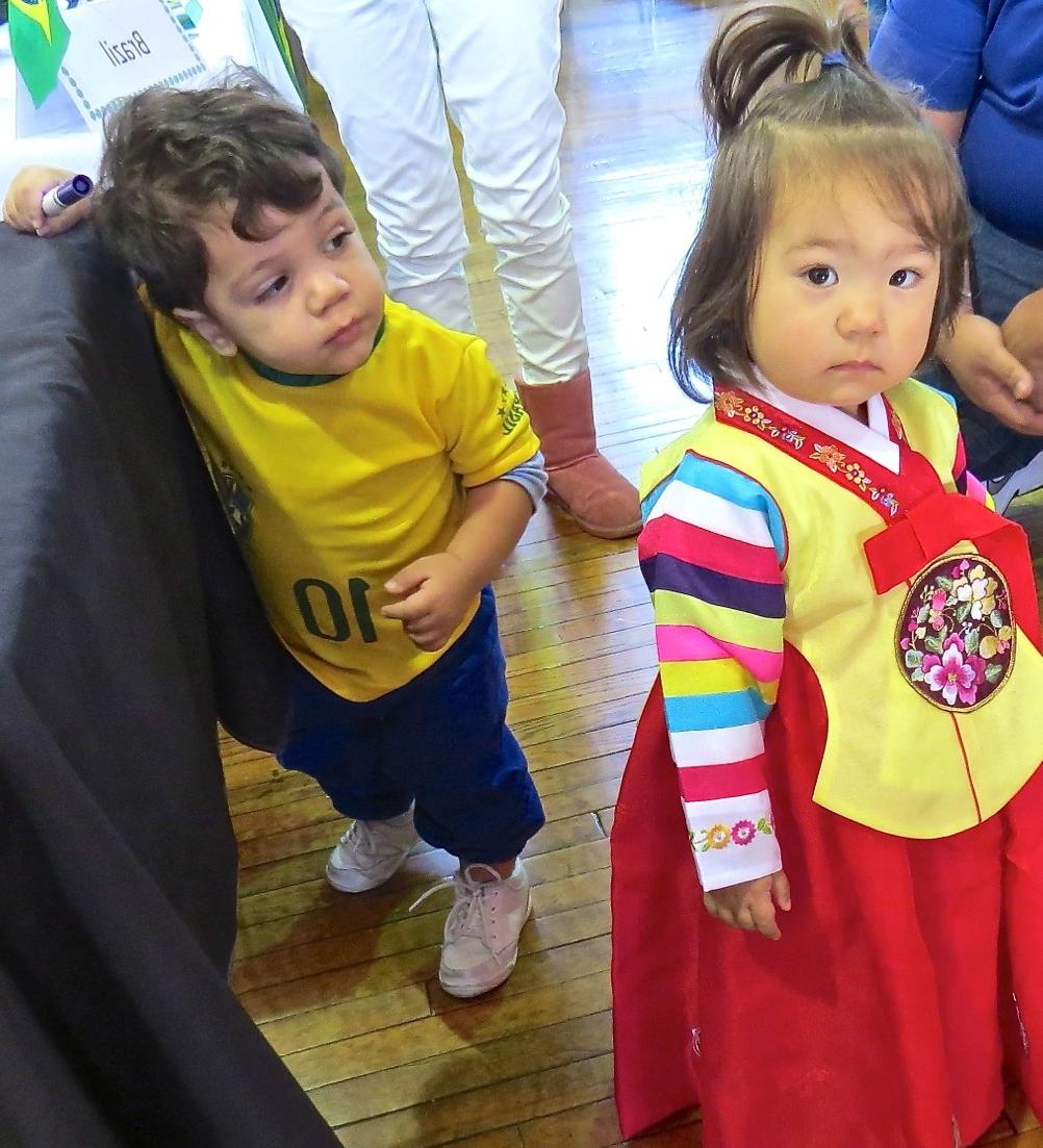 Among the youngest to attend Campbellsville  University's annual International Education Fair  were Sarana Henderson, one and a half, at left,  from Korea, and Lucas Barros, also one and a half,  from Brazil. They were at the International  Education Fair with their parents who are  attending CU. (Campbellsville University Photo by  Linda Waggener)