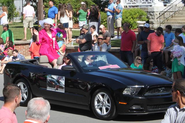 Jessica Blakeman, Campbellsville University's Valentine Queen, rides in the parade as she  competes for the Kentucky Mountain Laurel Festival Queen in Pineville, Ky. 