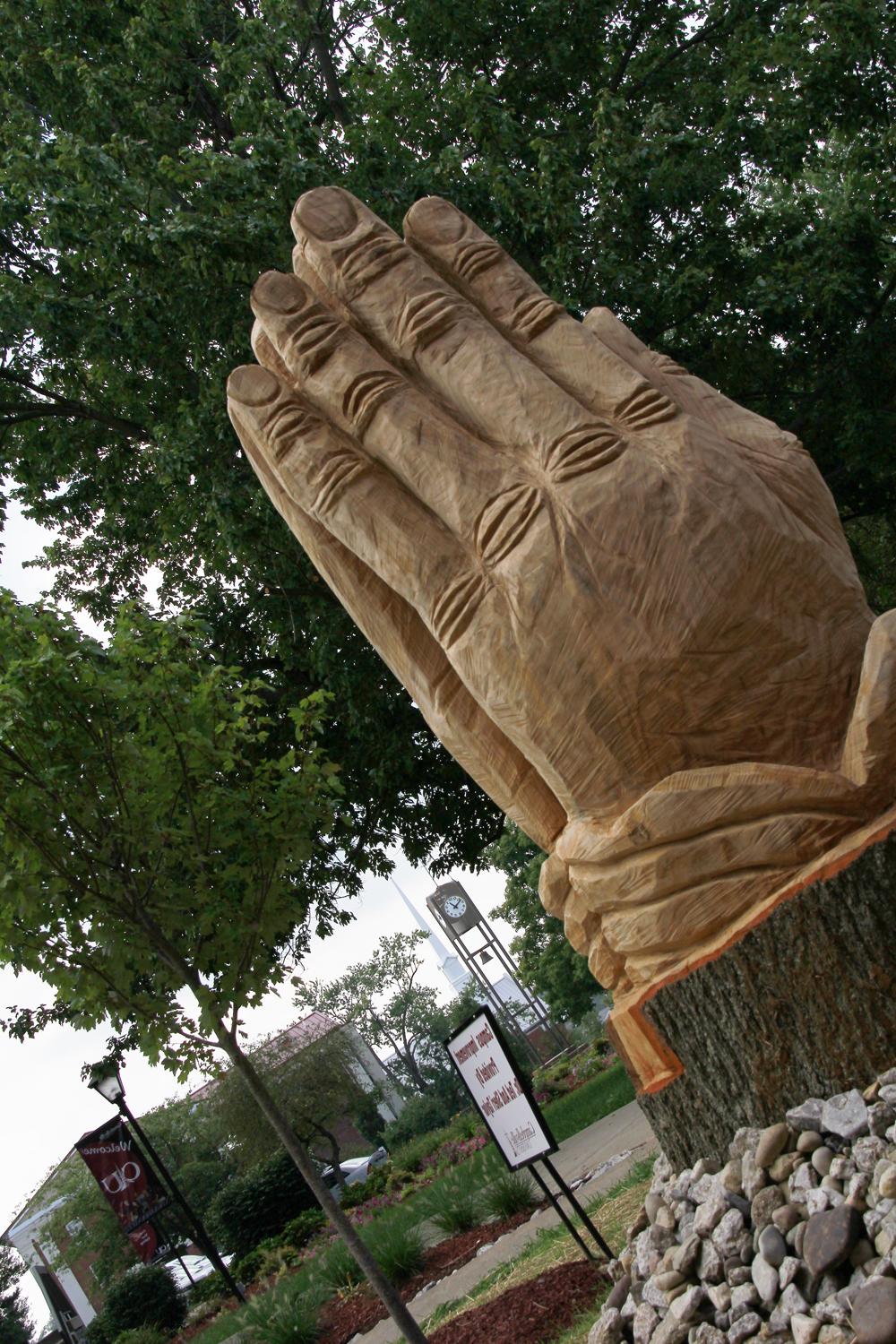 The praying hands was carved by Rob Peterson.  (Campbellsville University Photo by Rachel DeCoursey)