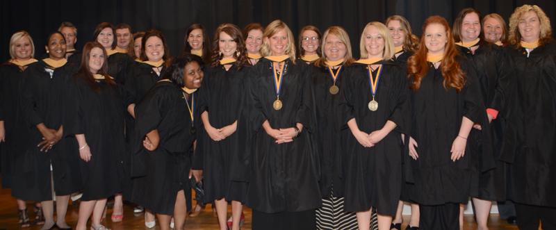 Master's of Social Work whom attended Campbellsville University's pinning ceremony include: from left - Tammy Thrasher, Erica Stephens, Rebecca Wright, Sarah Yates, Morgan Williams, Melissa McIntosh, Brandelynn Troxell, Rachel Moran, Kelli Jordan, Michelle Nevels, Makayla Jessie, Chellsey Phillips, Jonnecia Bradford, Kayla Hood, Christy Spaulding, Brian Tucker, Kasey Gray, Amanda Florence, Shawn Lanham, Shianne Anderson-Monteiro and Amanda Goodlett. (Campbellsville University Photo by Drew Tucker)