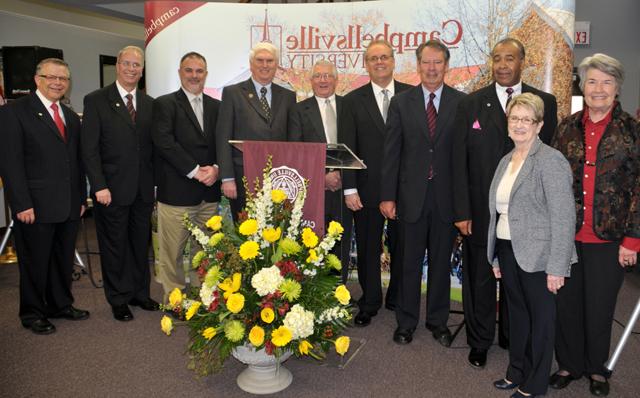 Among those at the dedication of the Ron Lewis’ congressional papers were from left: Virginia Flanagan, special assistant to the president; Dr. Mary Wilgus, dean of the College of Arts and Sciences; Dr. Joseph Owens, chairman of the Board of Trustees; Ron Lewis; Tony Young, mayor of Campbellsville; Eddie Rogers, Taylor County judge/executive; Congressman John Duncan, U.S. Representative for the 2nd District in Tennessee; John (Bam) Carney, Kentucky State Representative; Dr. Michael V. Carter; and John Chowning, vice president for church and external relations and executive assistant to the president. (Campbellsville University Photo by Linda Waggener)