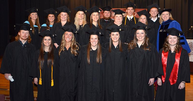  Campbellsville University’s School of Education graduates who were pinned and hooded in a ceremony Dec. 12 include, from left: Back row - Dr. Donna Hedgepath, dean of the School of Education; Jarrod Fenwick of Lebanon, Ky.; Courtney Wilson of Russell Springs, Ky.; Jeremy Bell of Harlan, Ky.; Carla Simpson of Elizabethtown, Ky.; Zach Cox of Elkhorn, Ky.; Jennifer Newton of St. Francis, Ky.; Rita Cox of Nancy, Ky.; Brittany McMahan of Campbellsville, Ky.; Ashley Hatcher of Owensboro, Ky.; and Meryl Settle of Munfordsville, Ky. Front row - Gayla Tungate of Lebanon, Ky.; Samantha Vanhoose of Flatwoods, Ky.; Samantha Coomer of Campbellsville, Ky; Sarah Dodd of Louisville, Ky.; Emily Wesley of Danville, Ky.; Angela Miller of Bowling Green, Ky.; and Seth McFerrin of Old Hickory, Tenn. (Campbellsville University Photo by Drew Tucker)