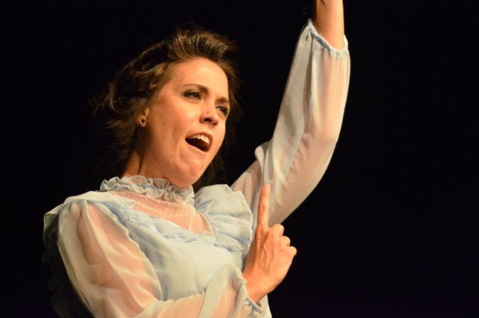 Kelli Stanfield as Eliza Doolittle singing song during the play My Fair Lady. (Campbellsville University Photo by Calen McKinney)