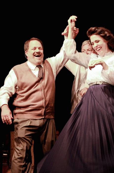 Kelli Stanfield as Eliza Doolittle and Ray Hollenbach as Mr. Higgins dancing on a song.