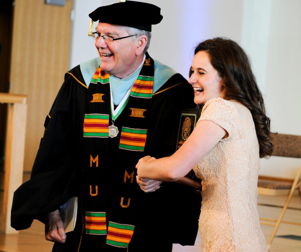 Abby Harnack of Bowling Green, Ky., takes a photo with Dr. Keith Spears, vice president for communications and assistant to the president, after the Honors and Awards Day at Campbellsville University. (Campbellsville University Photo by Joshua Williams)