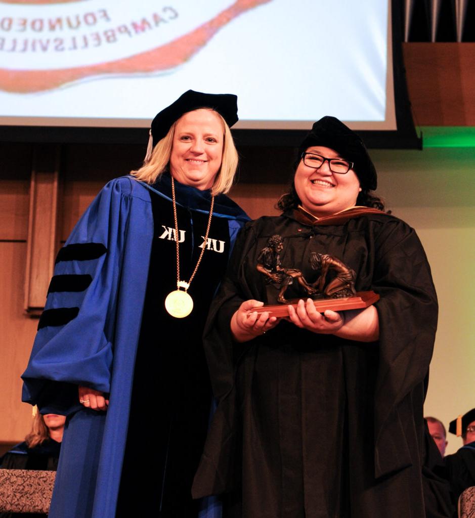 Susie Williams, assistant professor of art and design, received the Servant Leadership award from Dr. Donna Hedgepath, vice president for academic affairs, during the Honors and Awards Day at Campbellsville University. (Campbellsville University Photo by Joshua Williams)