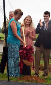  Amy Matthews, campus director for the Campbellsville University Harrodsburg campus, shovels a scoop of dirt at the groundbreaking for the new building behind the Conover Education Center. (Photo By Kasey Ricketts, communications assistant)