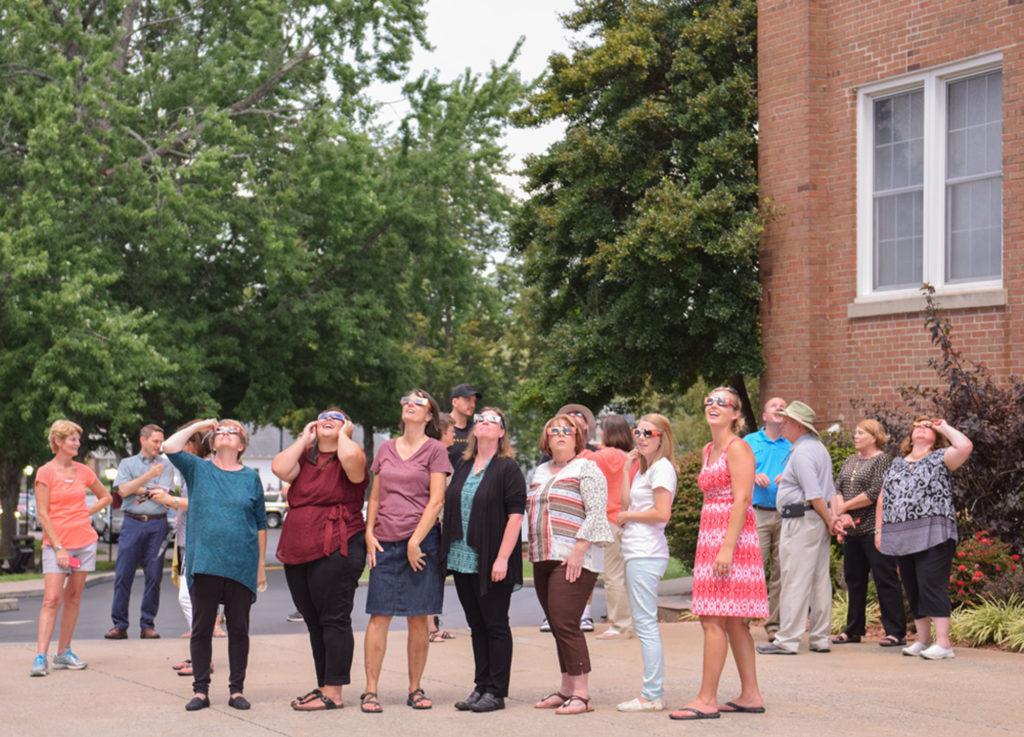 Looking at the eclipse in front of the Administration Building