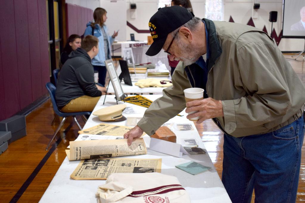 Everett Greer checks out different items from different time periods at the history of Campbellsville University and the City of Campbellsville Exhibition during 2017 Homecoming at Campbellsville University. (Campbellsville University Photo by Kyrsten Hill)