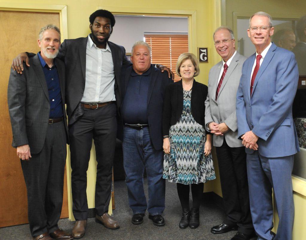 Victory Christian Fellowship pastor Mark Harrell, at right, and his congregation welcomed Dr. Michael Carter and Herve Metsam to share with their congregation on Sunday. From left are: Steve Hadden, University Outreach advancement director at CU; Dr. Michael V. Carter, president of Campbellsville University; Debbie Carter, CU First Lady; the Rev. Rick Curry, guest evangelist; Herve Metsam, CU graduate student and Church Outreach preacher from Camaroon; and pastor Harrell. (Campbellsville University Photo by Linda Waggener)